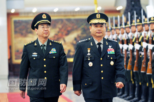 Gen. Fang Fenghui (L), member of the Central Military Commission and chief of general staff of the Chinese Peoples Liberation Army (PLA), holds a welcome ceremony for Gen. Jeong Seung-jo (R), chairman of the Joint Chiefs of Staff of the Armed Forces of the Republic of Korea (ROK), and accompanies him to review the guard of honor of the PLA in Beijing, capital of China, June 4, 2013. (mod.gov.cn/Li Xiaowei)