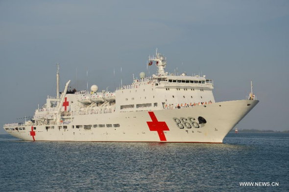 The Chinese People's Liberation Army Navy hospital ship Peace Ark arrives at Muara Port, Brunei, June 16, 2013. The Chinese People's Liberation Army Navy hospital ship Peace Ark arrived here June 16 to make a port call and participate in the ASEAN Defence Ministers' Meeting Plus (ADMM-Plus) Humanitarian Assistance &Disaster Relief (HADR) and Military Medicine (MM) Exercise. (Xinhua/Zheng Jie)