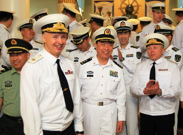 Ding Yiping, deputy commander of Chinese People's Liberation Army navy (center) at the opening ceromony for the drill. [Photo/Xinhua]