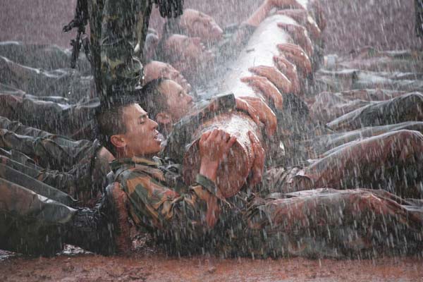 Soldiers from China and India take part in the Hand in Hand joint military drill in 2007, in Kunming, Yunnan province. The drill was the first joint anti-terrorism exercise for the two armies since 1962, when the two Asian neighbors had a brief border conflict. The two countries held another Hand in Hand drill a year later. [Li Gang / Xinhua ]