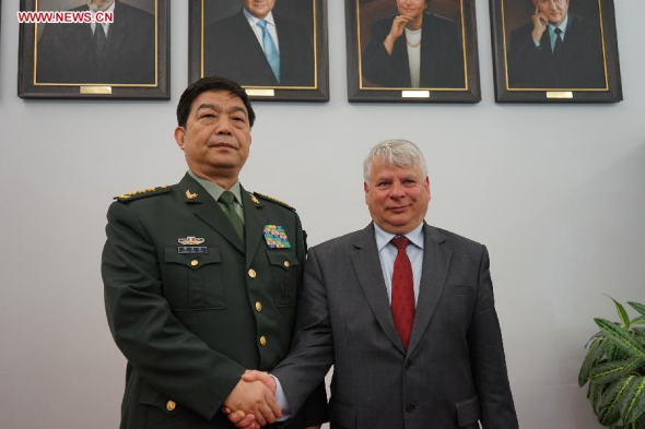 Speaker of the Polish Senate Bogdan Borusewicz shakes hands with visiting Chinese State Councilor and Defense Minister Chang Wanquan (L) in Warsaw, Poland, on Sept. 2, 2014. Speaker of the Polish Senate Bogdan Borusewicz and visiting Chinese Defense Minister Chang Wanquan during their meeting here on Tuesday said there is potential for expanding bilateral defense cooperation. (Xinhua/Gan Fan)