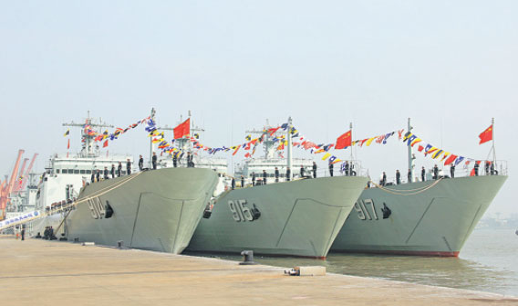 Three vessels, CNS Wuyishan, CNS Culaishan and CNS Wutaishan, are delivered to the East Sea Fleet at an unidentified naval port on Monday. (Photo: China News Service/Zhou Pengcheng)