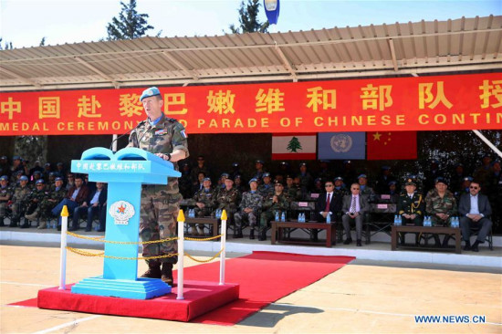 Pierre Liot de Nortbecourt, the chief staff of the United Nations Interim Force in Lebanon (UNIFIL), addresses a medal parade ceremony in honor of the Chinese contingent at the Chinese troops' camp in Hinniyah village in southern Lebanon, on March 8, 2017. (Xinhua)