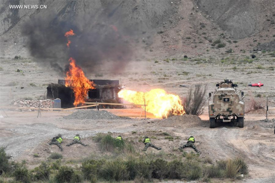 A joint anti-terrorist exercise is held by China and Kyrgyzstan frontier forces in Kizilsu Kirgiz Prefecture, northwest China's Xinjiang Uygur Autonomous Region, June 27, 2017. (Xinhua/Wang Fei)