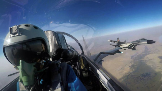 Two JH-7 fighter bombers attached to the Chinese PLA Air Force fly towards the designated airspace during an air-to-ground offensive operation drill conducted by two Chinese JH-7 fighter bombers and two Pakistani JF-17 fighter jets on Sept. 20, 2017. (Photo/eng.chinamil.com.cn)