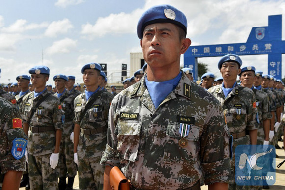 Chinese peacekeeping soldiers wait for the glorious moment at the medal-receiving ceremony on Oct. 3, 2017. (Xinhua/Li Zan)