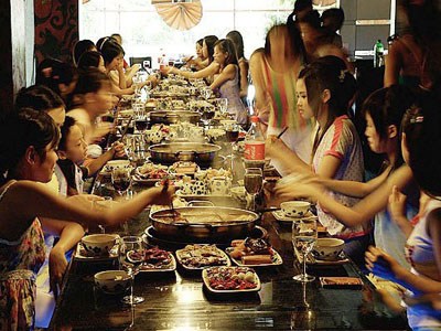 In the capital city of hot pot, people enjoy the cusine.