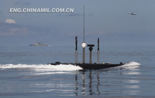 Upon its arrival at the predetermined sea area, the submarine started the drill of laying underwater mines. In recent years, the flotilla has completed actual-troop live-ammunition drills on such subjects as underwater torpedo salvo, underwater over-the-horizon missile attack, underwater concealed mining and blockade and great depth navigation, and joint military exercises on such important subjects as joint attack and joint blockade in cooperation with surface ships and aviation force.