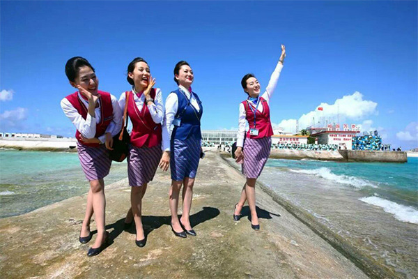 Chinese stewardesses celebrate. (Photo/Xinhua)