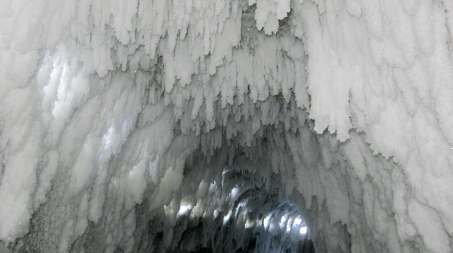 Cold spell turns artificial dragon into snow and ice cave