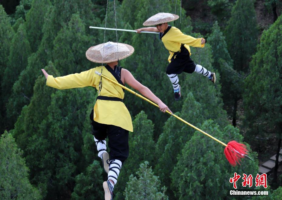 Kung Fu masters practice above Mt. Song in C China
