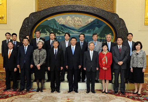 Chinese Vice President Xi Jinping (Front Row, C) poses for a group photo with members of a delegation of Japanese lawmakers, headed by Masahiko Koumura, president of the Association of Dietmen League for Japan-China Friendship, in Beijing, capital of China, May 3, 2012. (Xinhua/Liu Jiansheng)