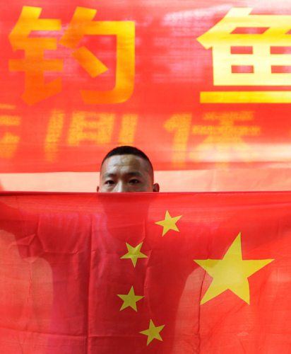 A protest in support of Chinas sovereignty over the Diaoyu Islands was held outside the Japanese embassy in Beijing on Wednesday, the anniversary of Japans World War II surrender. [Photo/Agencies]