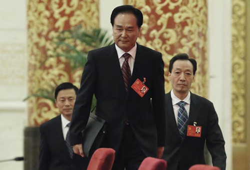 Cai Mingzhao, spokesman for the 18th National Congress of the Communist Party of China, arrives at his first news conference for the congress in Beijing on Wednesday.[Xu Jingxing / China Daily]