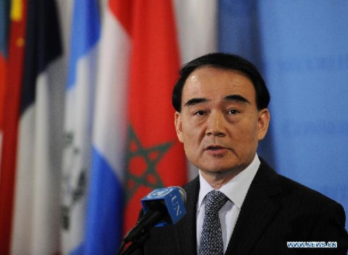 China's permanent representative to the United Nations Li Baodong speaks to reporters after the UN Security Council unanimously adopted a resolution about the Democratic People's Republic of Korea's satellite launch of Dec. 12, 2012, at the UN headquarters in New York, the United States, Jan. 22, 2013. Li Baodong said here on Tuesday that the UN resolution is an outcome of many rounds of consultations by all parties concerned, calling for peaceful solution to the Korean Peninsular issues. (Xinhua/Shen Hong)