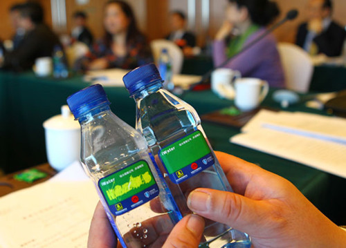 Mineral water provided during the two sessions this year carry tags that read Please finish the whole bottle of water, part of efforts to crack down on extravagance and waste. Zou Hong / China Daily