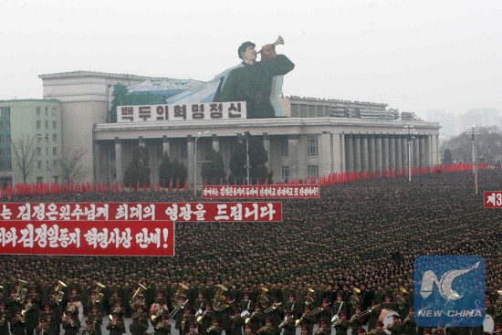 Military officers, soldiers and civilians gather to celebrate the success of the third nuclear test in Pyongyang on Dec. 14, 2012. (Photo: Xinhua/Zhang Li)