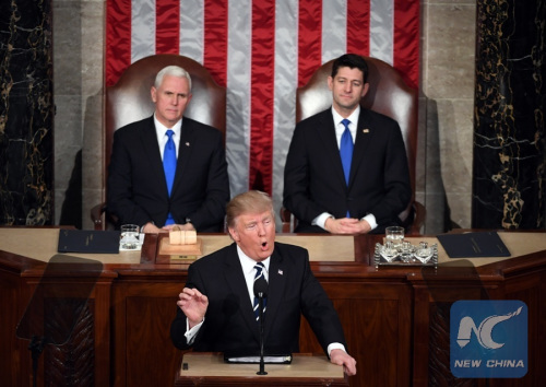 U.S. President Donald Trump (front) addresses the joint session of Congress, as Vice President Mike Pence (L) and House Speaker Paul Ryan listen, on Capitol Hill in Washington D.C., the United States, Feb. 28, 2017. (Xinhua/Yin Bogu)